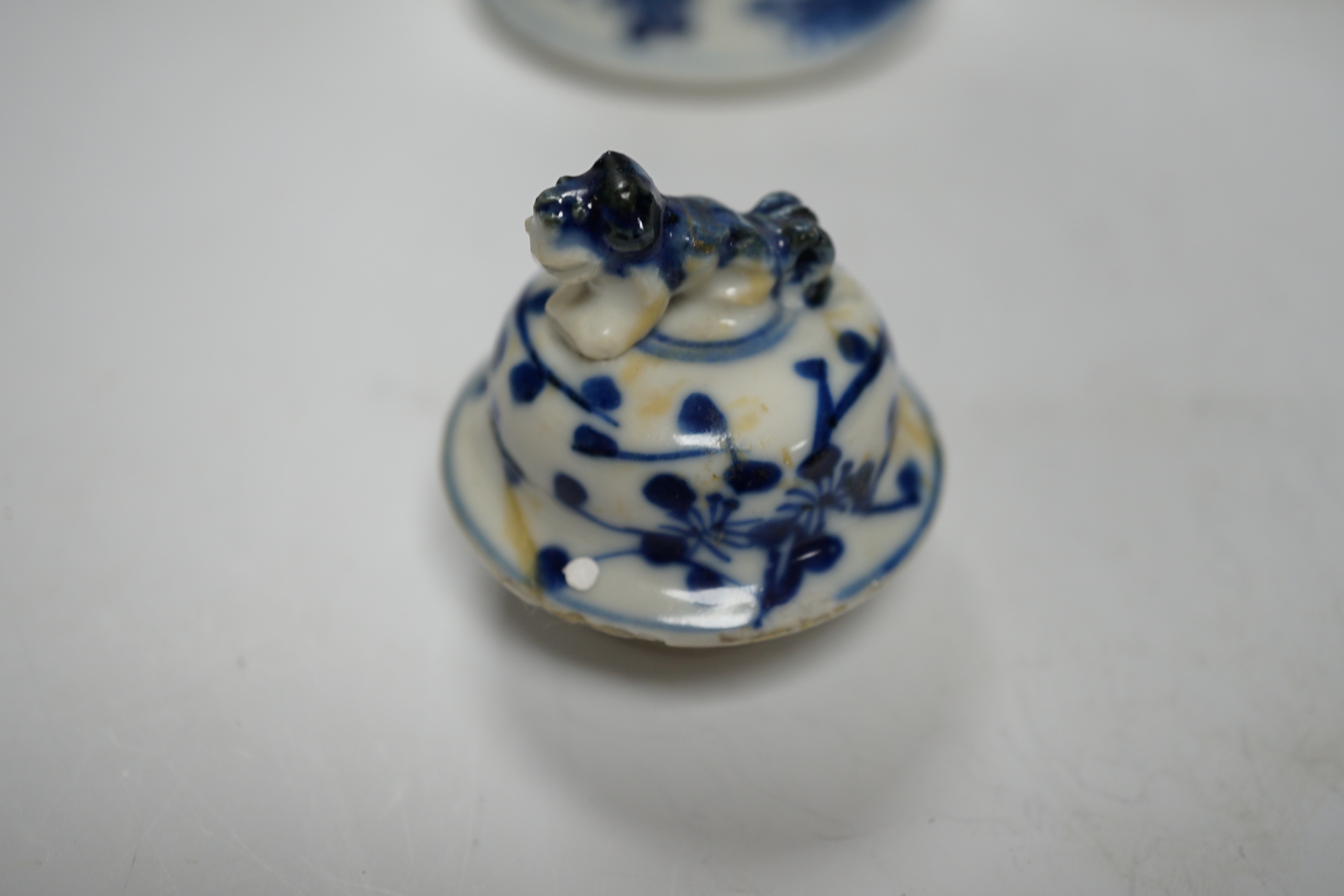 A late 19th century Chinese blue and white twin elephant head handle vase and five other 19th century Chinese blue and white vases, tallest 26cm